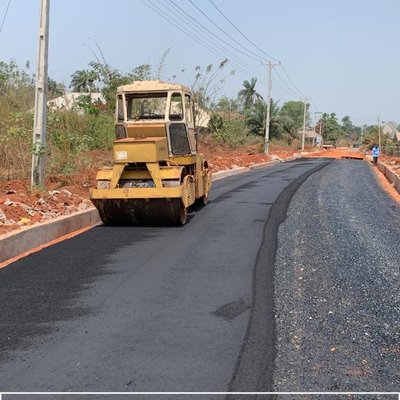 Compaction roller finishing asphalt paving, Irrua township roads rehabilitation, Edo State
