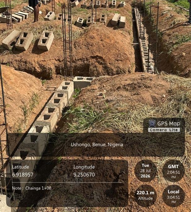 Concrete blockwork rising on foundation trenches, multipurpose hall project, Usar Science and Technical College, Benue State